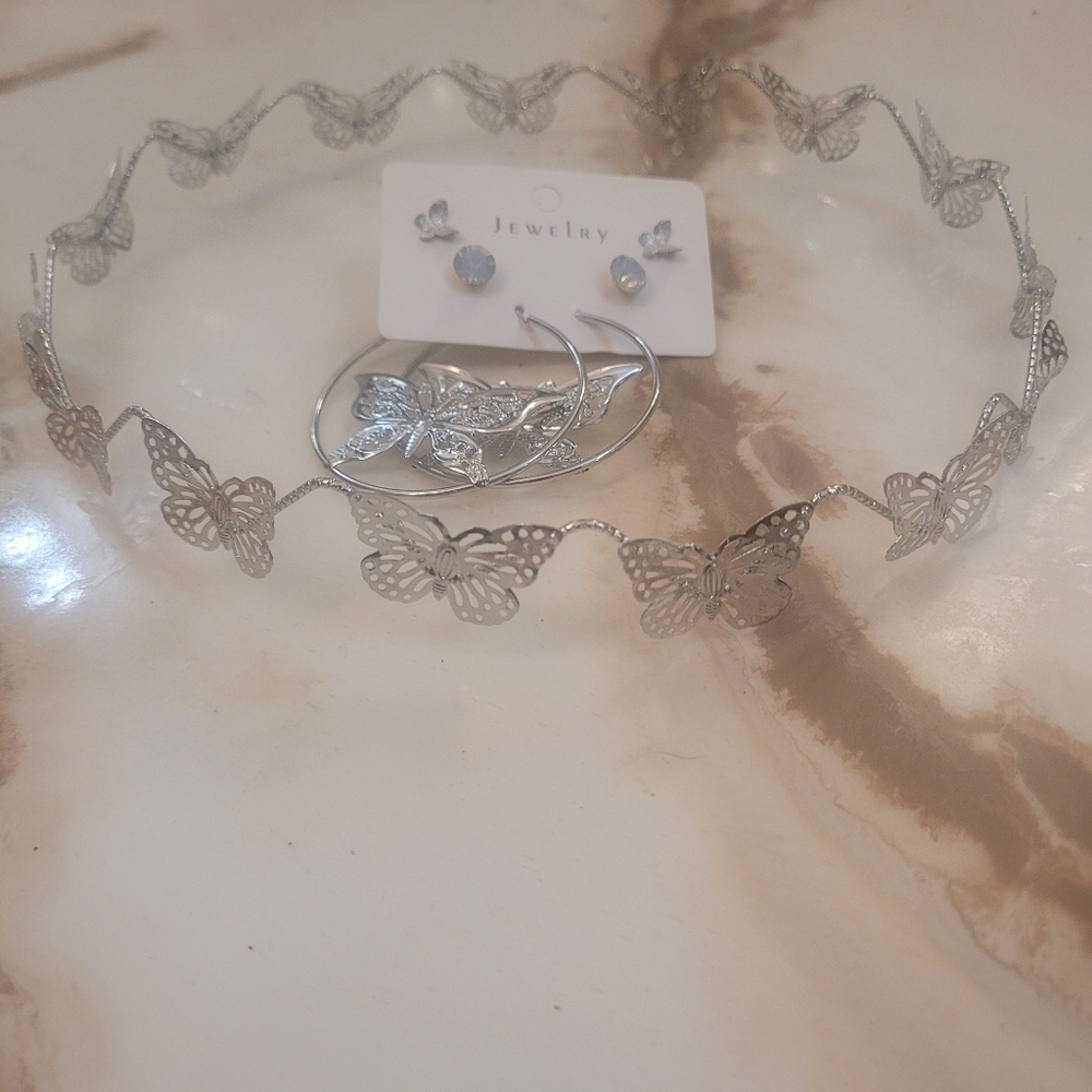 Beautiful butterfly headband/crown and 3 pairs of earrings.
